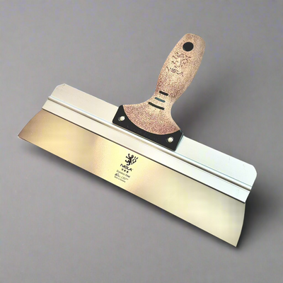 NELA square corner stainless steel taping spatula with BiKo cork handle on gray background