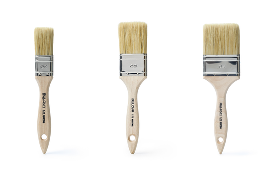 Three ICR Martina flat brushes in graduated widths with natural bristles and pale wood handles